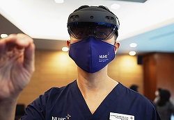 Dr Ngiam Kee Yuan Donning the HoloLens